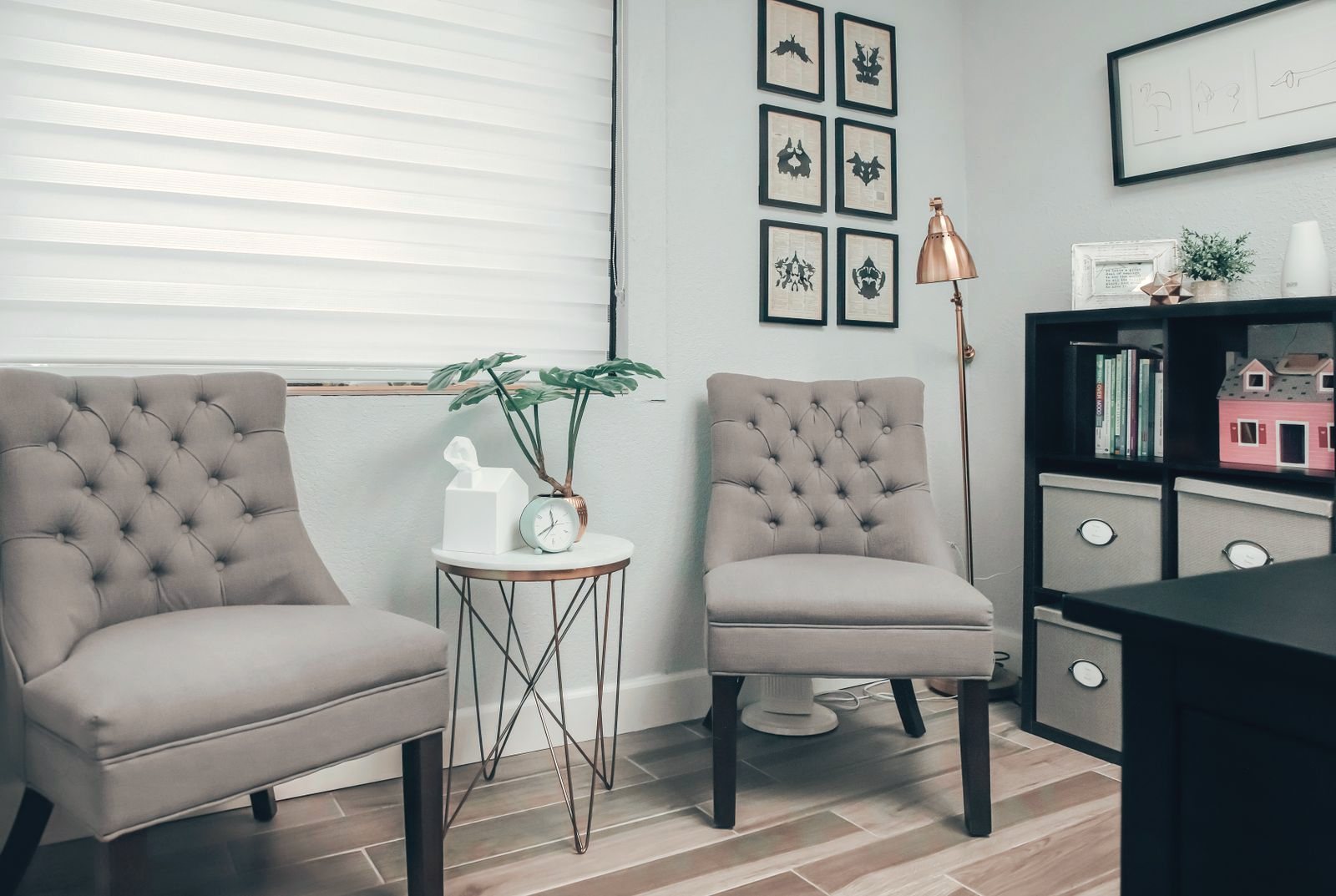 Calm, welcoming therapy office with two chairs beside a bright window